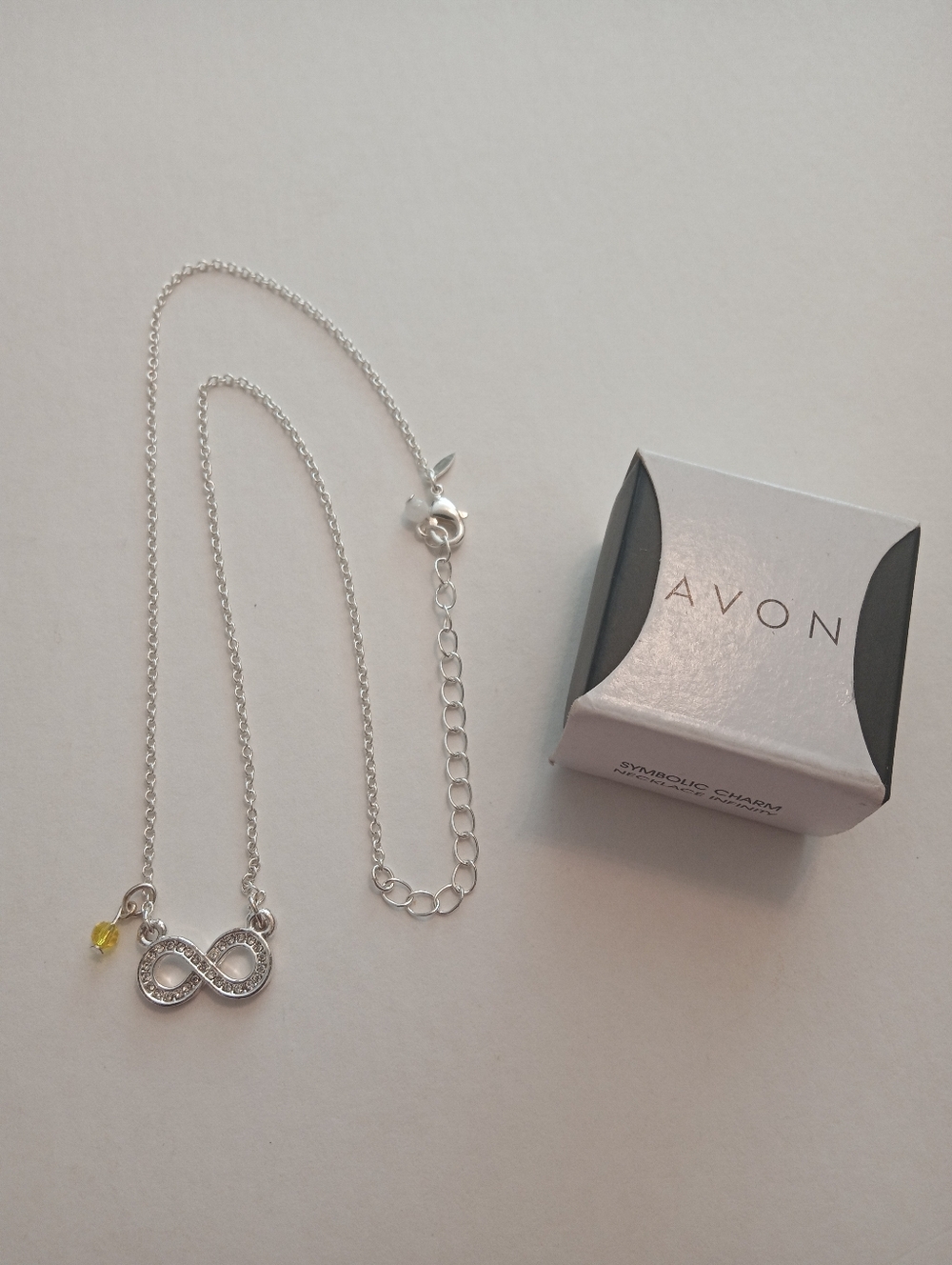 #1216. AVON Symbolic Charm Necklace Infinity Necklace With Original Box